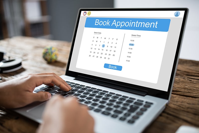 Booking an appointment on a laptop computer
